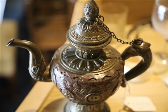A Tibetan bronze and brass repousse work water sprinkler, 19th century, H. 21cm